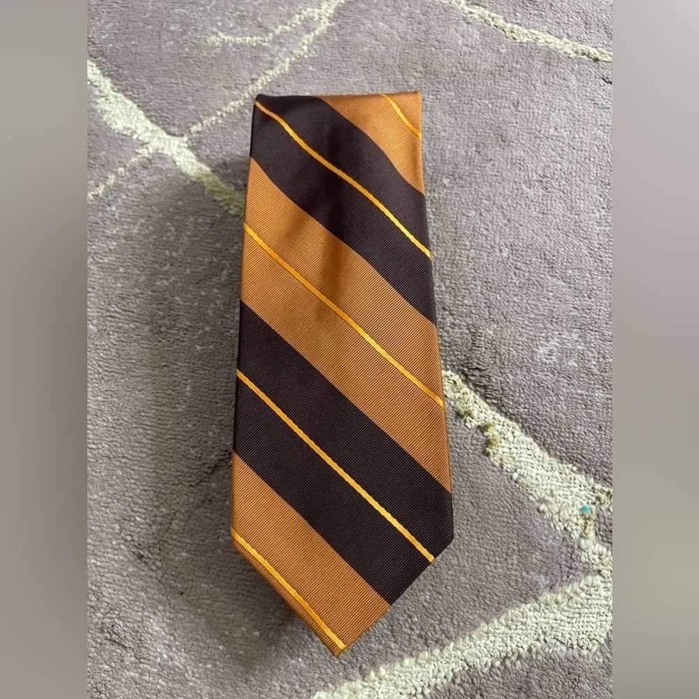 Peter millar bronz and brown tie .
